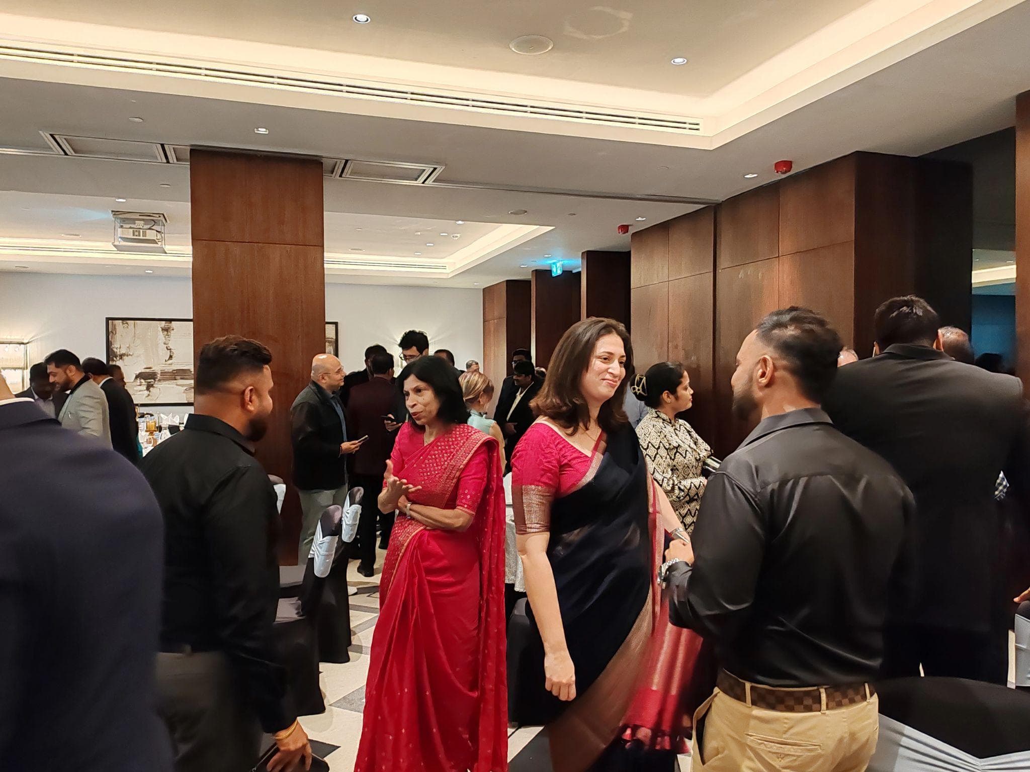 Networking with international delegates and industry leaders at the Dubai business forum.